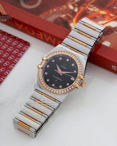 Omega-Constellation-OL55-GD-2-03 امگا وسط میخ طلا مردانه صفحه مشکی دور نگین Omega Constellation OL55-GD 2
