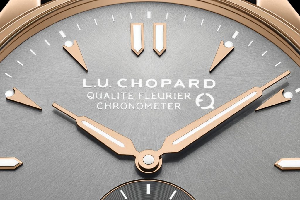 لوگوی بنیاد کیفیت فلوریه روی صفحه ساعت شوپارد